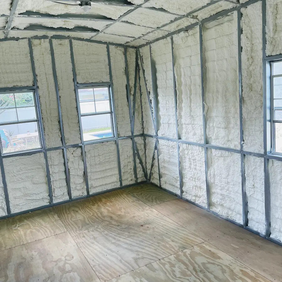 Closed-cell spray foam insulation applied to wall cavities in a residential project in Pennsville